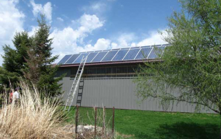 shed with solar panels installed on the roof