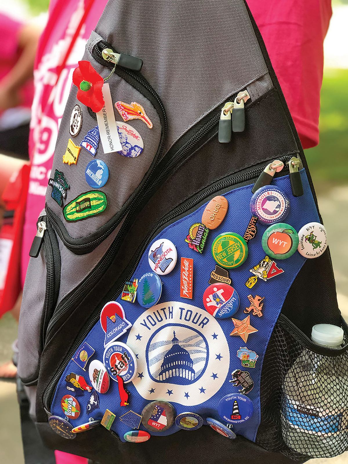 Backpack with pins on it