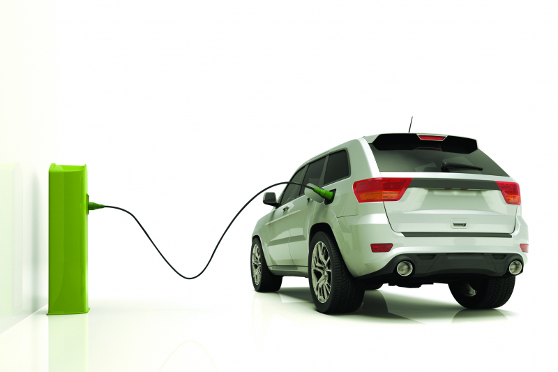 electrict car plugged to a power station Dakota Electric Association