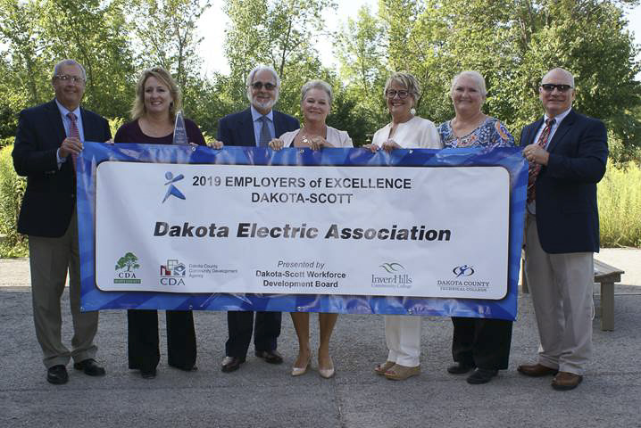 group holding banner