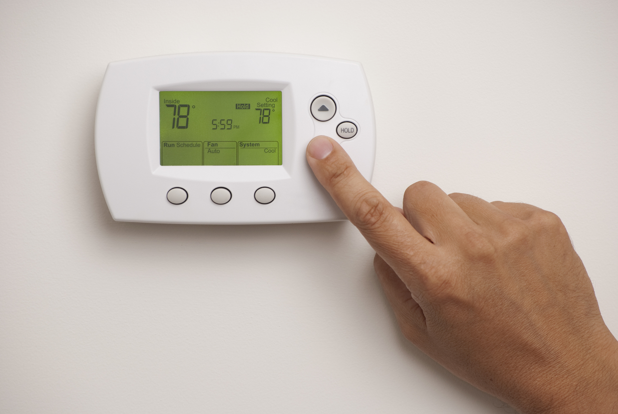 male-hand-on-digital-thermostat-set-at-78-degrees-dakota-electric