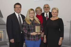 group with award plaque