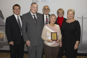 group with award plaque