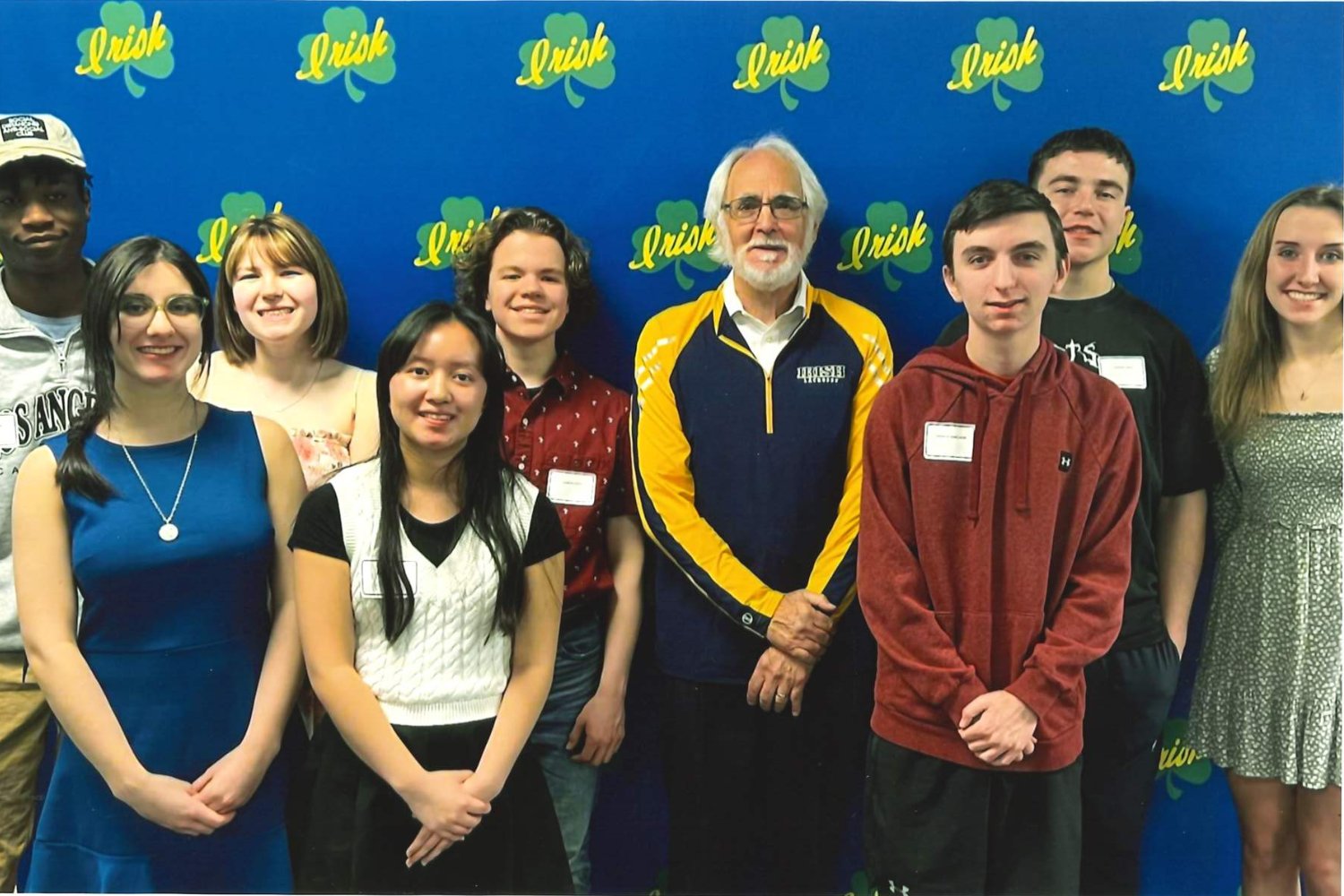 Group of students standing with a member of Dakota Electric Board of Directors